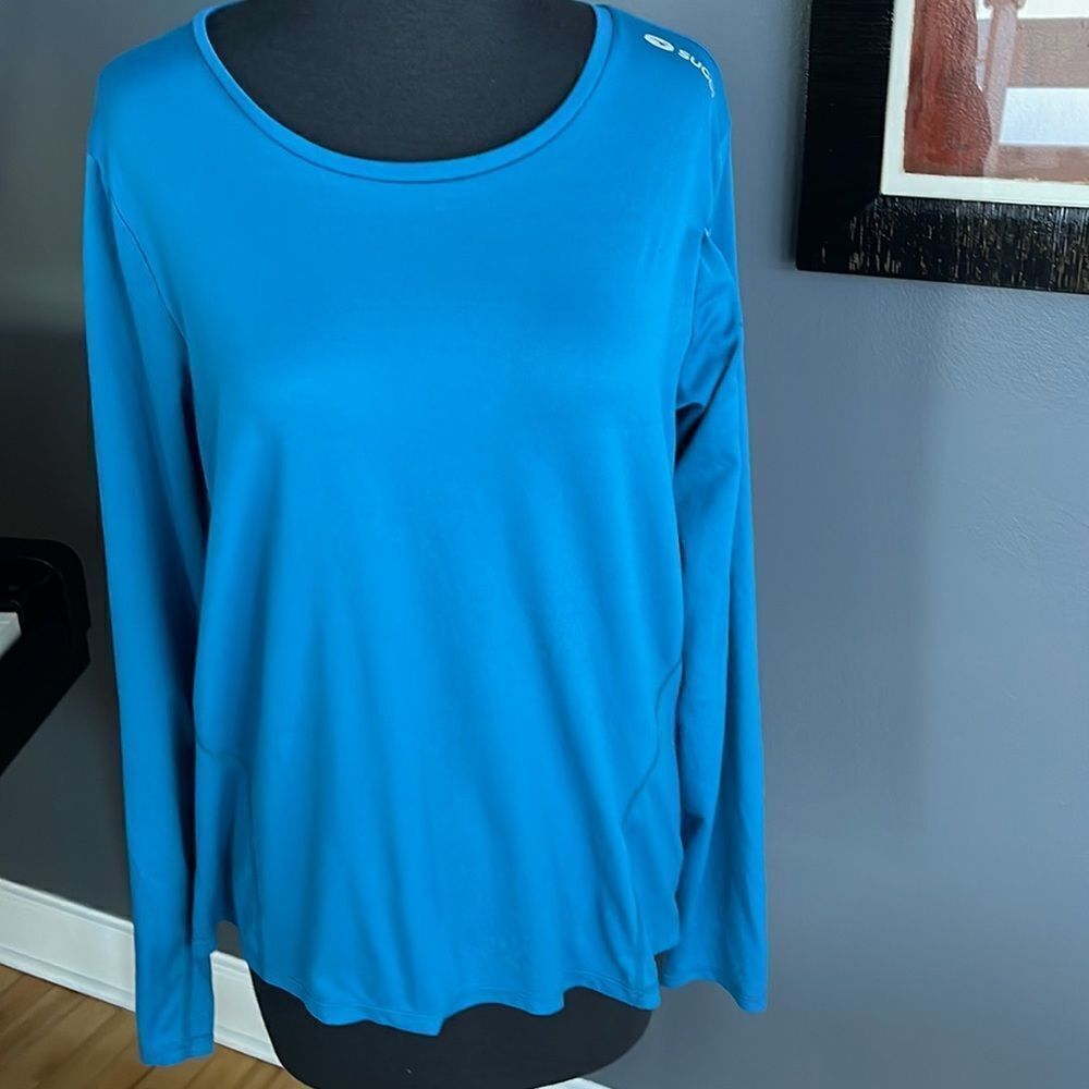 Sugoi teal stretch banded crew neckline long sleeve workout top. XL